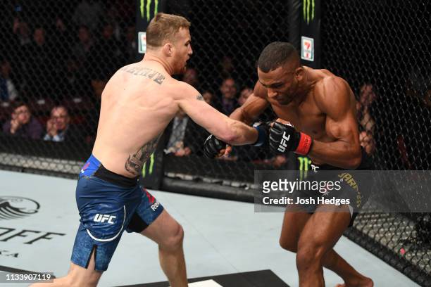 Justin Gaethje punches Edson Barboza of Brazil in their lightweight bout during the UFC Fight Night event at Wells Fargo Center on March 30, 2019 in...