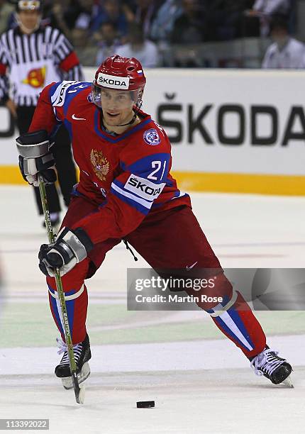 Konstantin Gorovikov of Russia skates with the puck during the IIHF World Championship group A match between Russia and Slovenia at Orange Arena on...