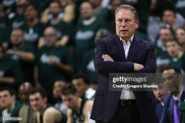 Head coach Tim Izzo of the Michigan State Spartans reacts on the bench while playing the Nebraska Cornhuskers at Breslin Center on March 05, 2019 in...