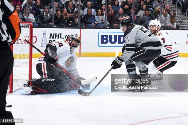Goaltender Corey Crawford of the Chicago Blackhawks makes the save against Austin Wagner of the Los Angeles Kings during the third period of the game...