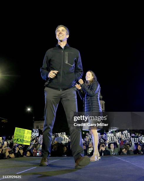 Beto O'Rourke is joined on stage by his wife Amy Hoover Sanders as he kicks off his campaign for president at his third rally of the day in front of...