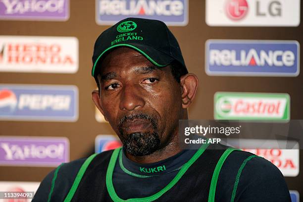 Ireland cricket coach Phil Simmons addresses a press conference at The Sher-e Bangla National Stadium in Dhaka on February 24 after a team training...