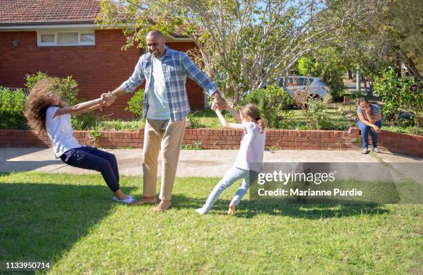 a family at home - thisisaustralia stock-fotos und bilder