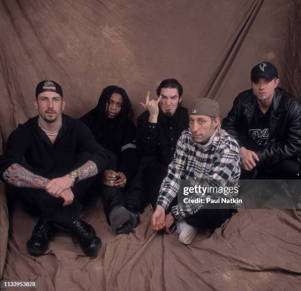 Portrait of American Rock group Sevendust as they pose backstage at the Allstate Arena, Rosemont, Illinois, January 7, 2000. Pictured are, from left,...