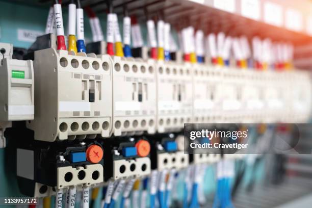 magnetic breakers. electrical background . control panel with wiring. - electrical switchboard stock pictures, royalty-free photos & images