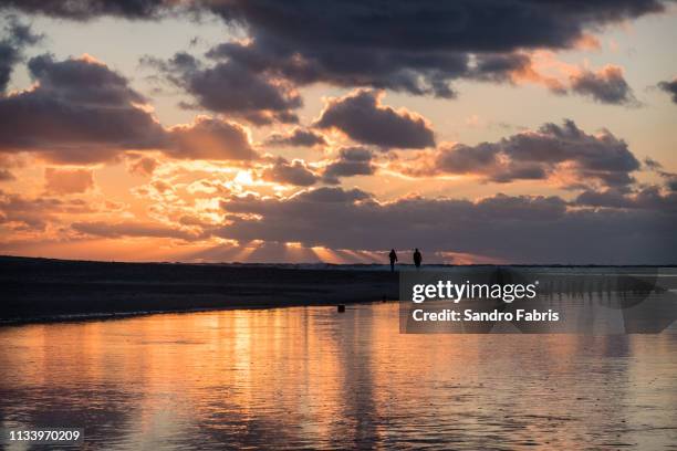 sunset beach ocean  dawn reflections - sunset beach hawaï stockfoto's en -beelden