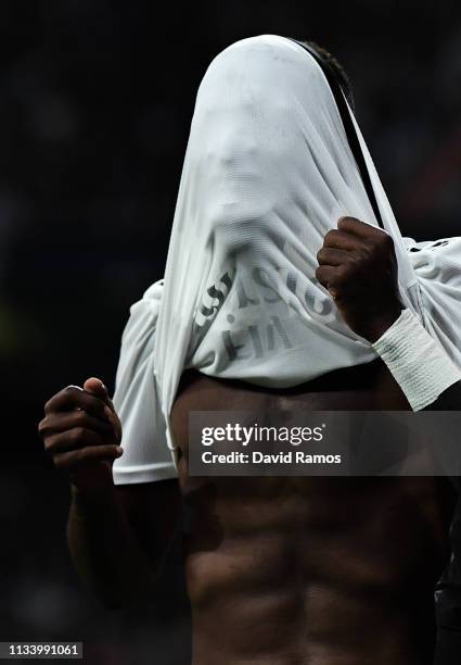 Vinicius JR of Real Madrid CF reacts during the UEFA Champions League Round of 16 Second Leg match between Real Madrid and Ajax at Bernabeu on March...
