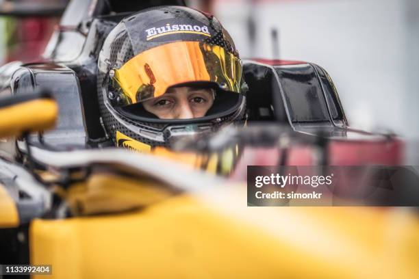 man driving formula racing car - will power race car driver stock pictures, royalty-free photos & images