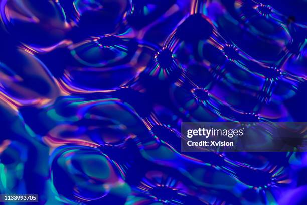 colorful cymatic pattern of sound taken by the water reflection"n - abstract sound stock-fotos und bilder