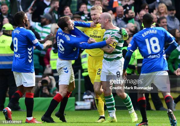 Scott Brown and Scott Bain of Celtic are confronted by Andy Halliday of Rangers at the final whistle during the Ladbrokes Scottish Premiership match...