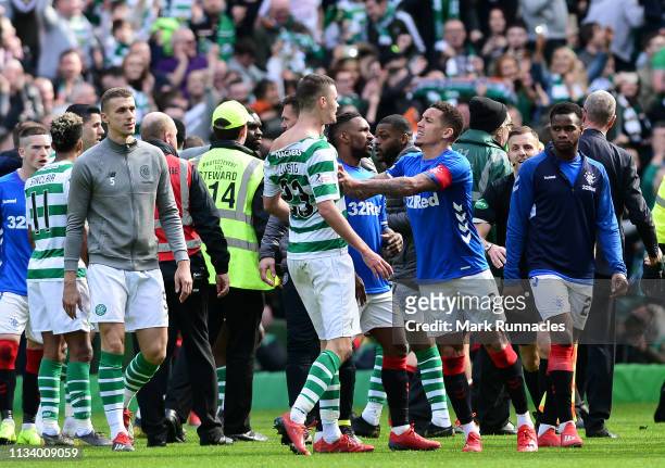 Mikael Lustig of Celtic and James Tavernier of Rangers confront one another at the final whistle during the Ladbrokes Scottish Premiership match...