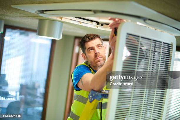 Ac Service Engineer 239 Air Conditioner Service Office Stock Photos, High-Res Pictures, and ...