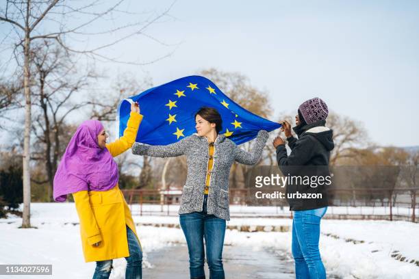waving european union flag - serbia eu stock pictures, royalty-free photos & images