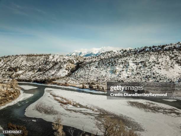 aerial view of the yellowstone river in montana in winter - yellowstone river stock pictures, royalty-free photos & images