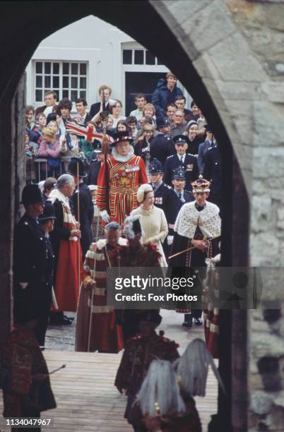 Prince Charles in procession with Queen Elizabeth after the ceremony of his investiture as Prince of Wales at Caernarfon Castle, Gwynedd, Wales, 1st...