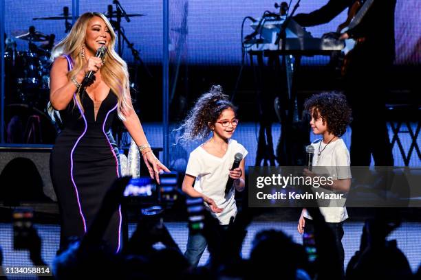 Mariah Carey performs onstage with Monroe Cannon and Moroccan Cannon during the the Caution World Tour at Fox Theater on March 05, 2019 in Atlanta,...