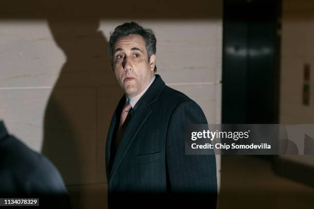 Michael Cohen, former attorney and fixer for President Donald Trump, arrives at the secure offices of the House Intelligence Committee in the...