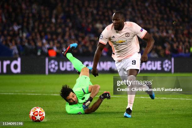 Romelu Lukaku of Manchester Unted round Gianluigi Buffon of Paris saint-Germain before scoring the opening goal during the UEFA Champions League...