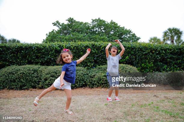 boy and girl dancing carefree - the charleston dance fotografías e imágenes de stock