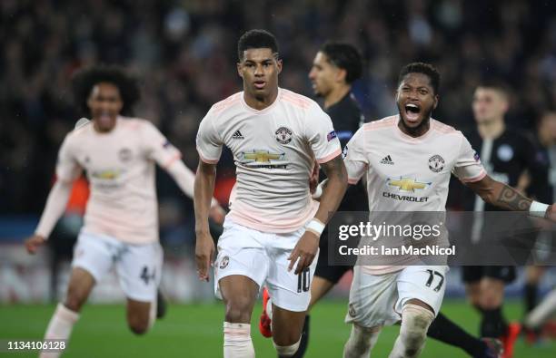 Marcus Rashford of Manchester United celebrates after he scores the third goal during the UEFA Champions League Round of 16 Second Leg match between...