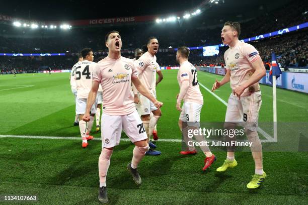 Diogo Dalot of Manchester United celebrates after Marcus Rashford scores his sides third goal during the UEFA Champions League Round of 16 Second Leg...