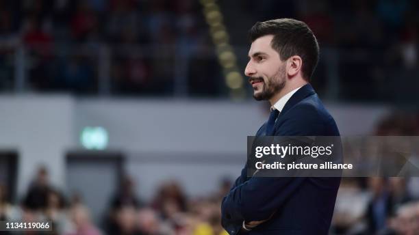 March 2019, Bavaria, Bamberg: Basketball: Bundesliga, Brose Bamberg - ALBA Berlin, main round, 26th matchday: Bamberg's coach Federico Perego follows...