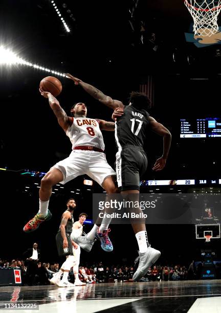 Jordan Clarkson of the Cleveland Cavaliers shoots against Ed Davis of the Brooklyn Nets during their game at Barclays Center on March 06, 2019 in New...