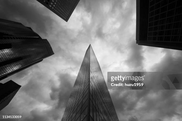 upward view of skyscrapers - 商業地域 stock pictures, royalty-free photos & images