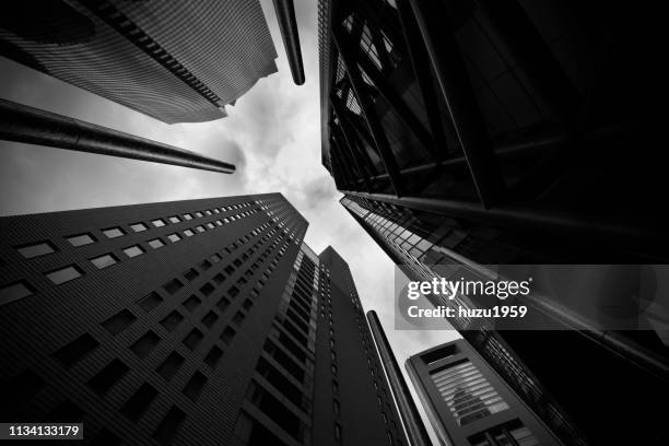 upward view of skyscrapers - 金融と経済 imagens e fotografias de stock