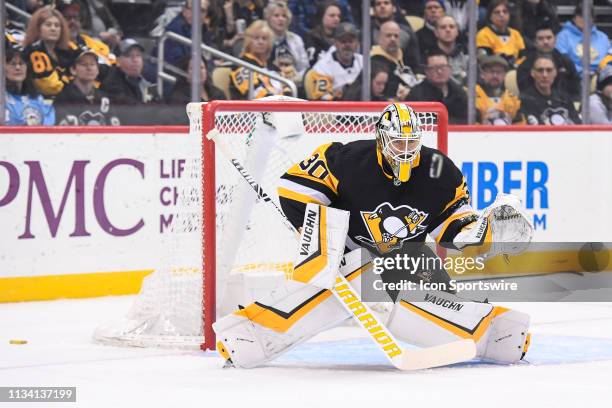 Pittsburgh Penguins Goalie Matt Murray makes a save during the first period in the NHL game between the Pittsburgh Penguins and the Carolina...