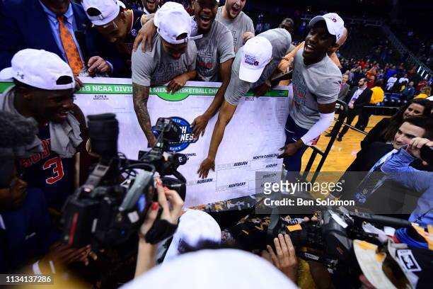 The Auburn Tigers advance their team in a bracket following their win over the Kentucky Wildcats in the Elite Eight round of the 2019 NCAA Photos via...