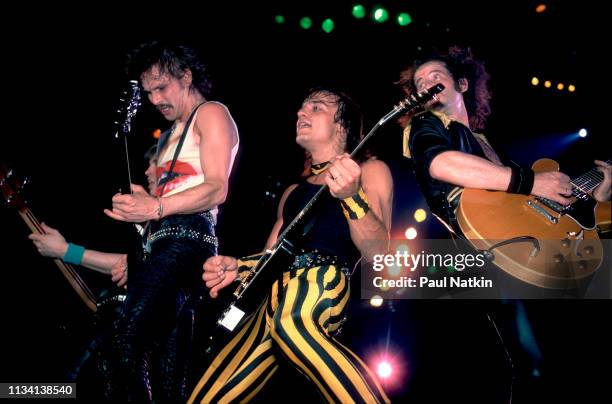 German Rock group Scorpions perform onstage at the Rosemont Horizon, Rosemont, Illinois, May 20, 1984. Pictured are, from left musicians Rudolf...