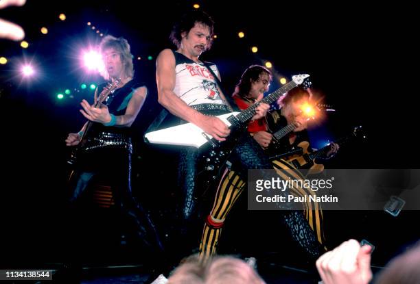 German Rock group Scorpions perform onstage at the Rosemont Horizon, Rosemont, Illinois, May 20, 1984. Pictured are, from left, Francis Buchholz, on...