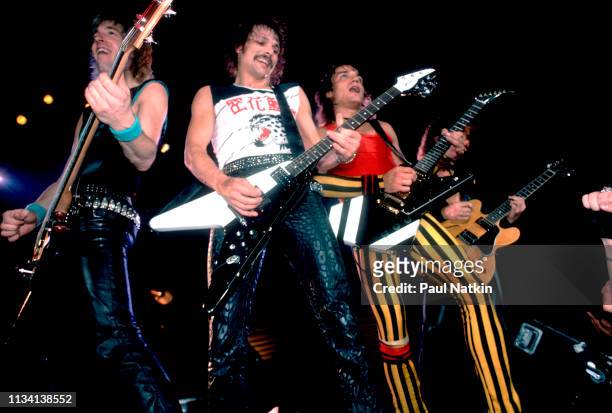 German Rock group Scorpions perform onstage at the Rosemont Horizon, Rosemont, Illinois, May 20, 1984. Pictured are, from left, Francis Buchholz, on...