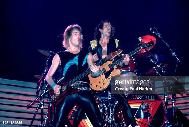 German Rock musicians Francis Buchholz , on bass guitar and Klaus Meine, on guitar, both of the group Scorpions, at the Rosemont Horizon, Rosemont,...