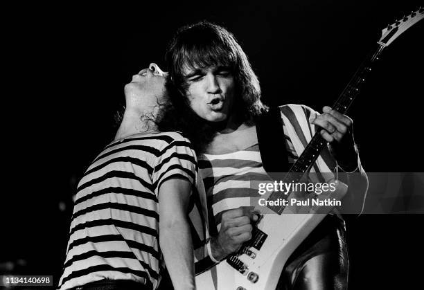 German Rock musicians vocalist Klaus Meine and Matthias Jabs, on guitar, both of the group of the Scorpions, perform onstage at the Aragon Ballroom,...