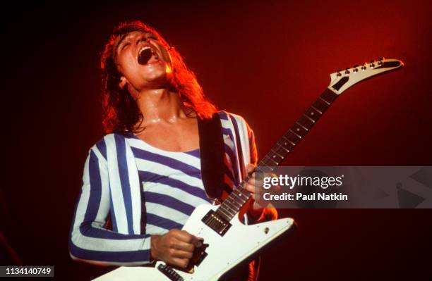 German Rock musician Matthias Jabs, of the group Scorpions, plays guitar as he performs onstage at the Aragon Ballroom, Chicago, Illinois, July 25,...