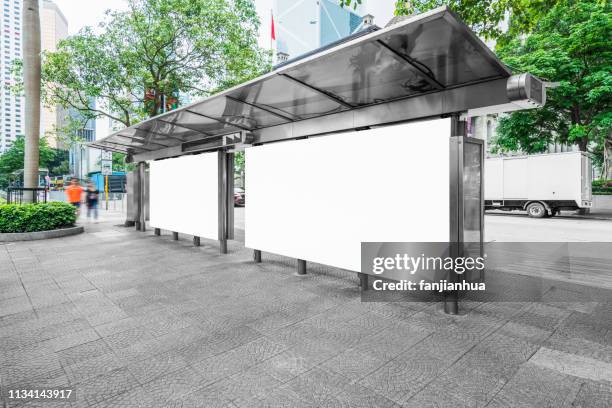 blank billboards at bus stop - billboards 2017 stock pictures, royalty-free photos & images