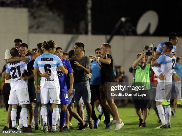 Marcelo Diaz and Lucas Orban of Racing Club celebrate with teammates after winning the Superliga 2018/19 against Tigre at Estadio Jose Dellagiovanna...