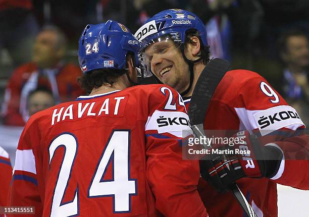 Milan Michalek of Czech Republic celebrates with team mate Martin Havlat after scoring their 4th goal during the IIHF World Championship group D...