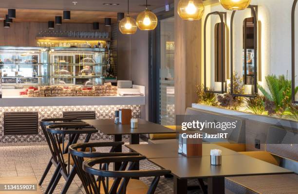 empty cafeteria - cafe interior stock pictures, royalty-free photos & images