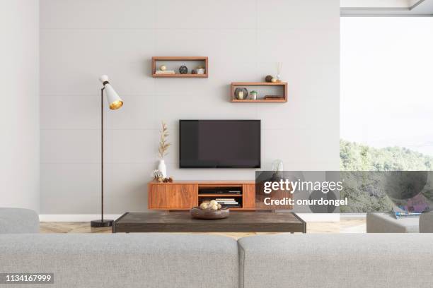 smart tv mockup mit leerem bildschirm im modernen wohnzimmer - smart tv stock-fotos und bilder