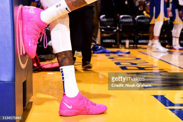 The sneakers of Kevin Durant of the Golden State Warriors are seen against the Charlotte Hornets on March 31, 2019 at ORACLE Arena in Oakland,...