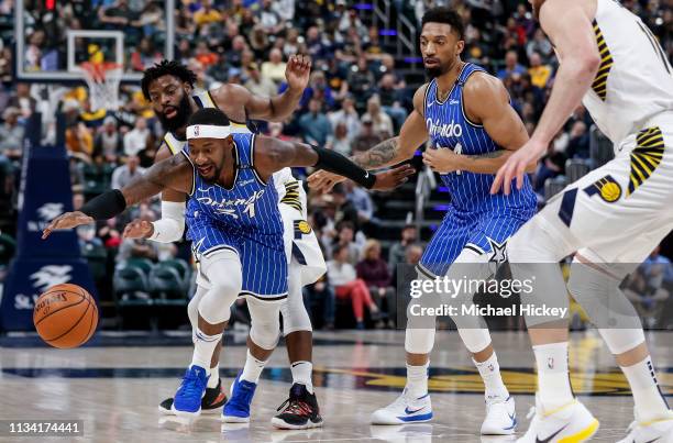 Terrence Ross of the Orlando Magic has the ball stripped away by Tyreke Evans of the Indiana Pacers at Bankers Life Fieldhouse on March 30, 2019 in...