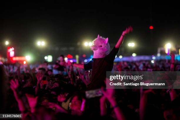 Fan wearing a goat mask dances during the third day of Lollapalooza Buenos Aires 2019 at Hipodromo de San Isidro on March 31, 2019 in Buenos Aires,...