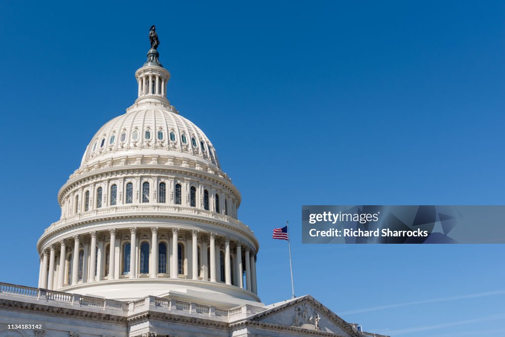 US Capitol building dome with American flag