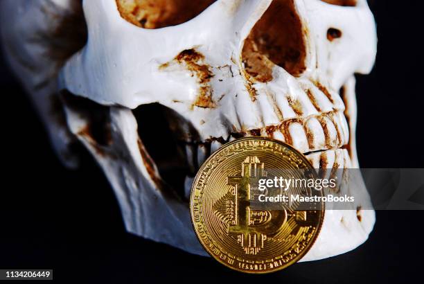 cryptocurrency is death and skull representing dead coins - death stock pictures, royalty-free photos & images
