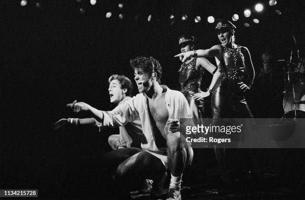 British singer-songwriters George Michael and Andrew Ridgeley of pop duo Wham performing at the Lyceum Theatre during the Club Fantastic Tour,...