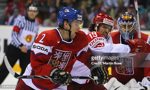 Zbynek Michalek of Czech Republic skates against Kim Staal of Denmark during the IIHF World Championship group D match between Czech Republic and...