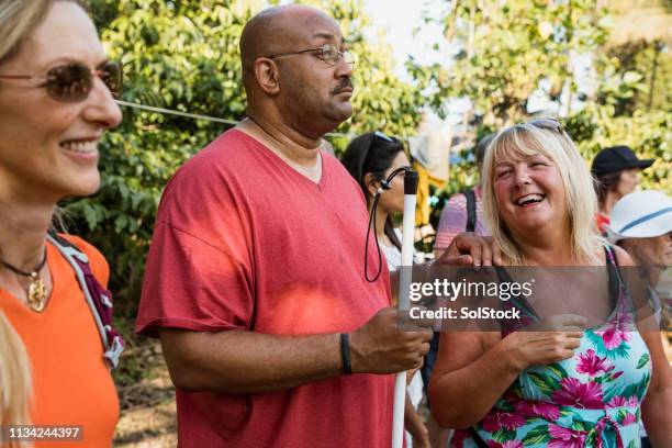 tourists exploring the outdoors - disabled india person stock pictures, royalty-free photos & images